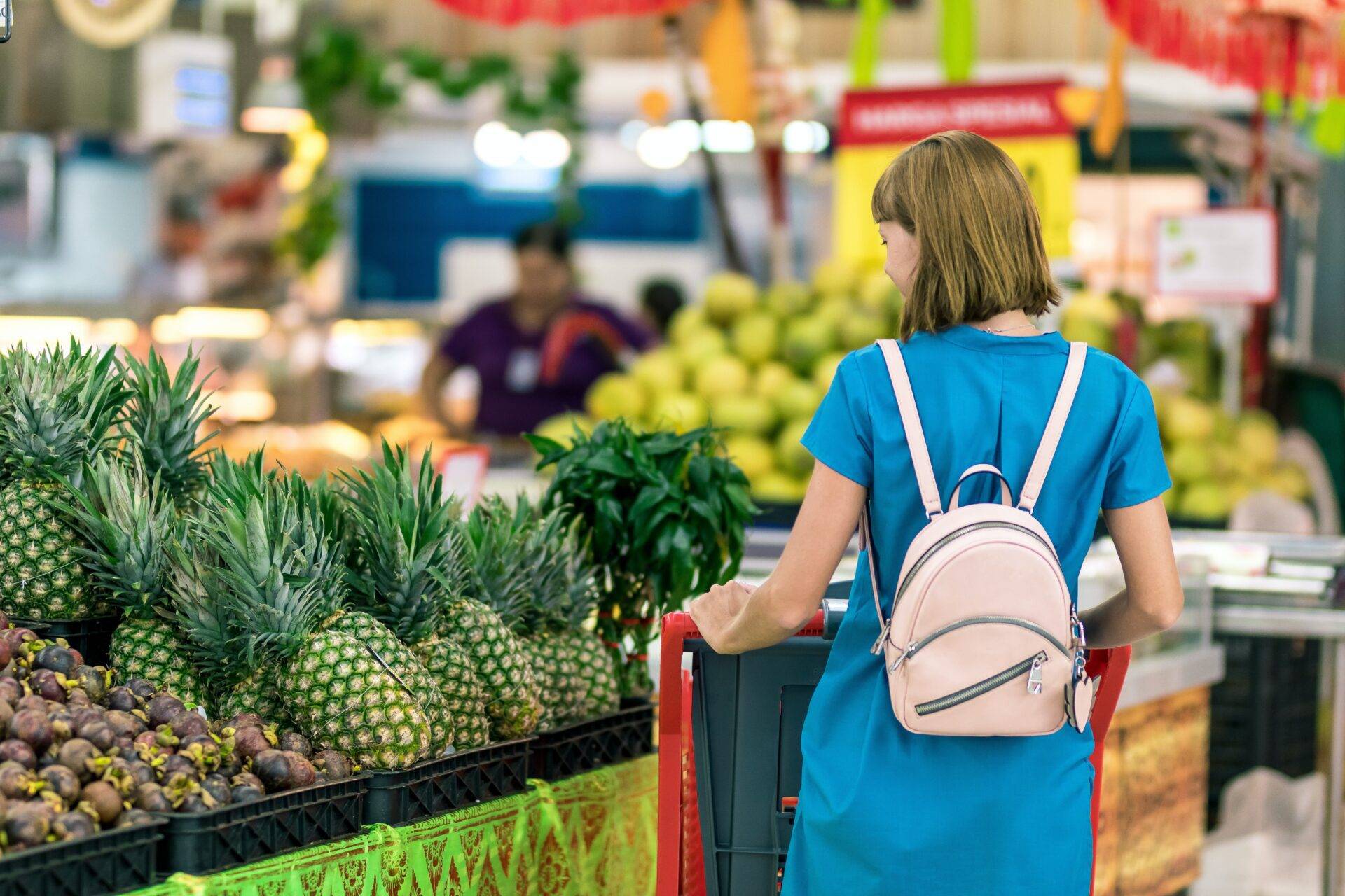 Consumer shopping for fruits and vegetables.